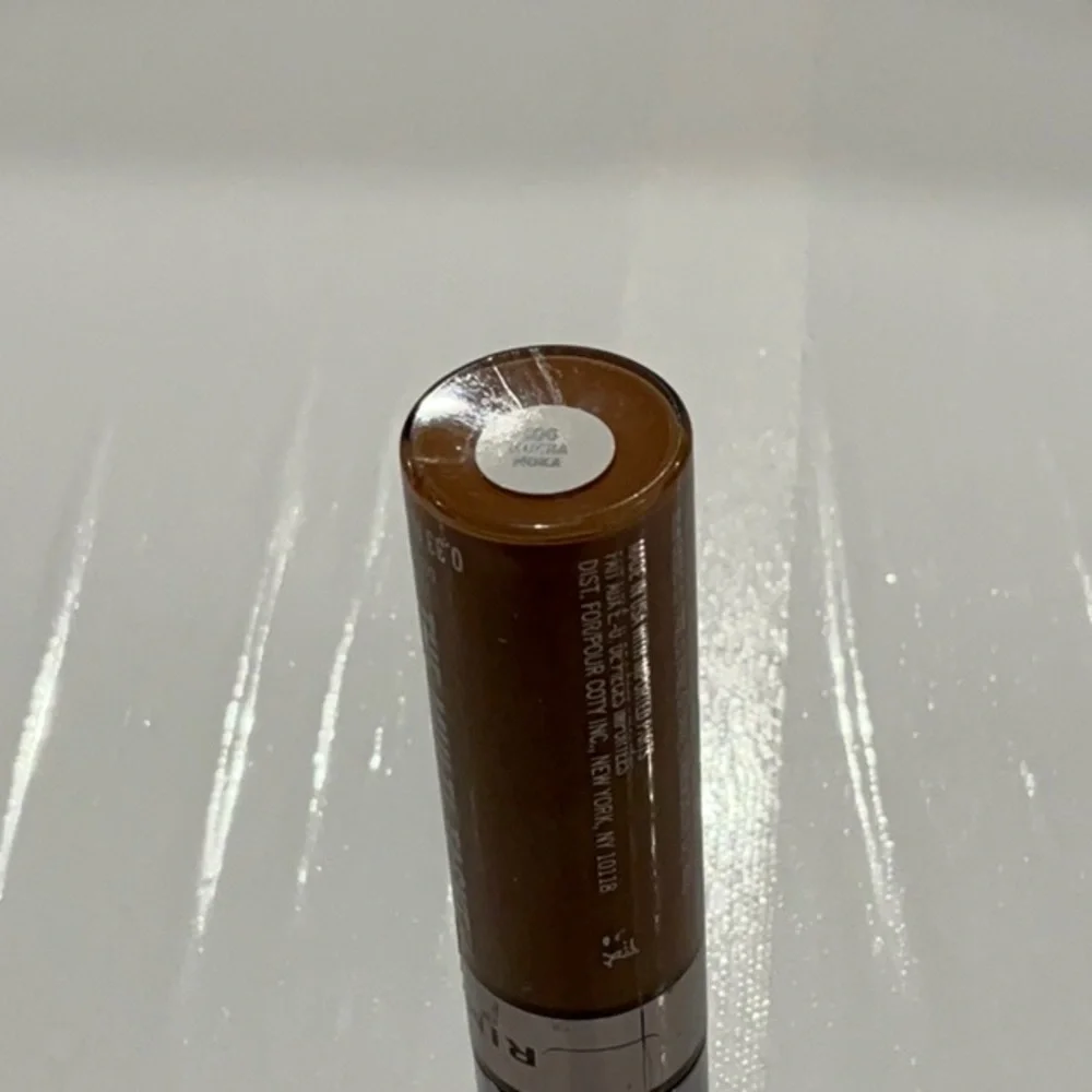 Rimmel London The Multi-Tasker Concealer. No. 100 Mocha